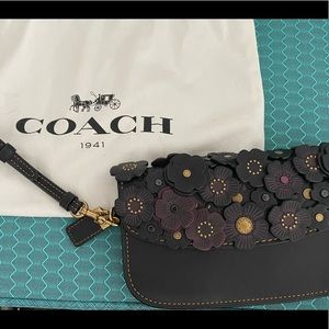 Classic Coach Flowered Wristlet with Gold Hardware. Hardly worn and looks new.
